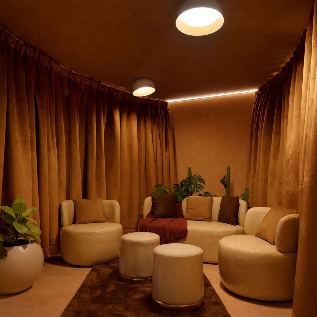 Pilates instructor adjusting posture